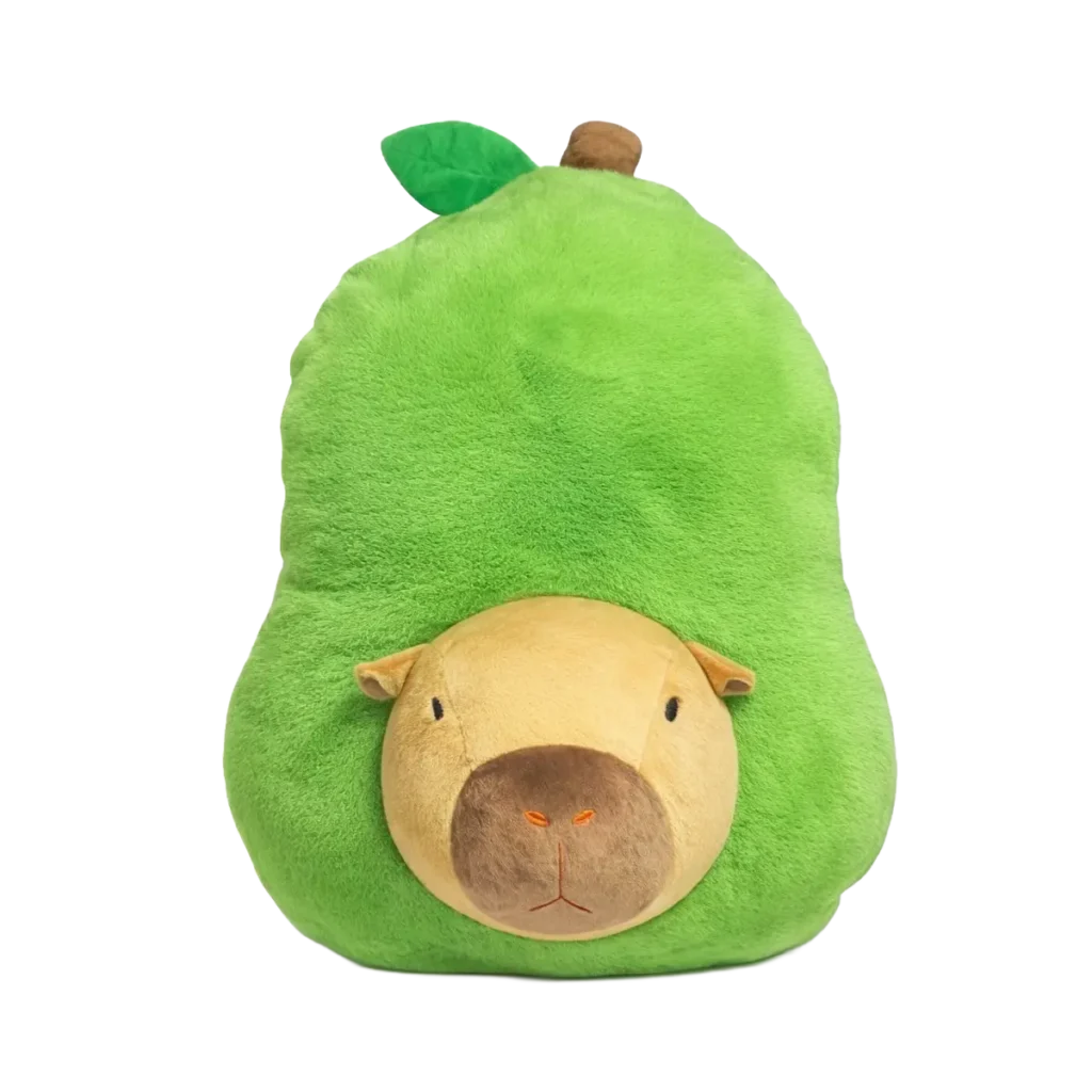 Green avocado-shaped plush toy with a capybara face on the front, featuring a soft texture and leaf detail on top, placed on a white background.