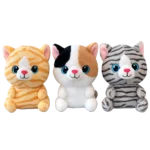 Three plush kitten toys in orange, calico, and grey sitting upright on a white background