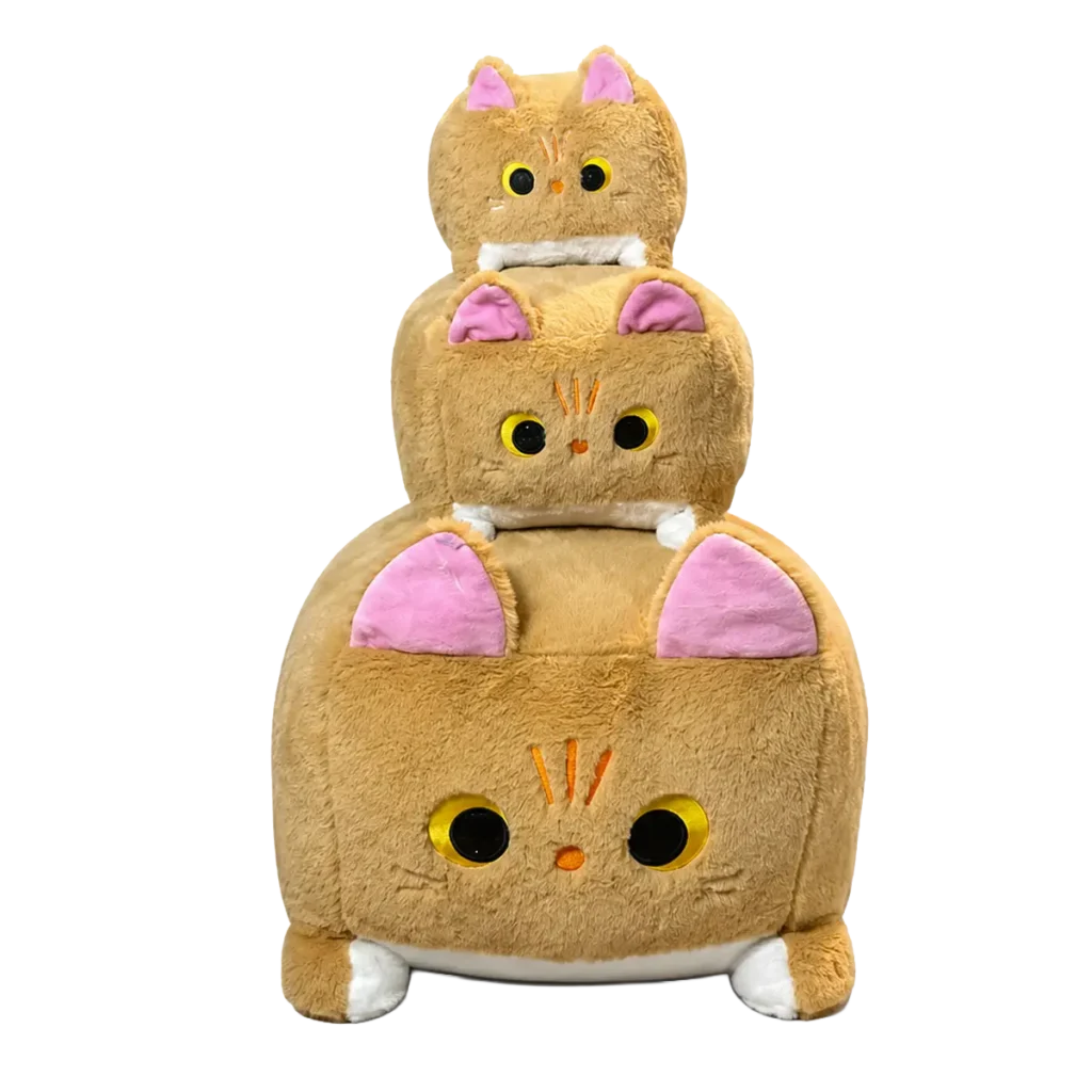 Three stacked beige cat plush toys with pink ears and large yellow eyes on a white background.