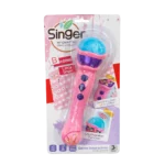 Pink toy singing microphone with blue glitter microphone head and purple buttons in retail blister packaging labeled “Singer Little Singer” with lighting effects and loudspeaker function.