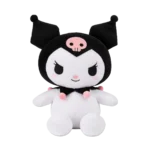 Kuromi plush toy with black jester-style ears, pink skull emblem and white body, isolated on a transparent background.