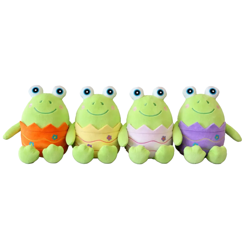 Four plush frog toys with big eyes and colourful patterned outfits in orange, yellow, white and purple.