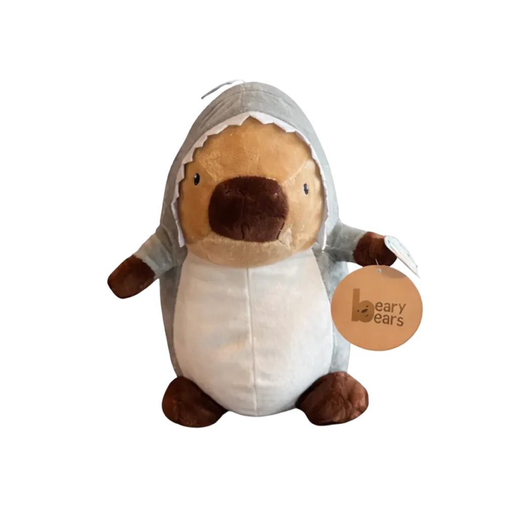 Plush capybara toy wearing a grey shark costume with hood, shown on a white background.