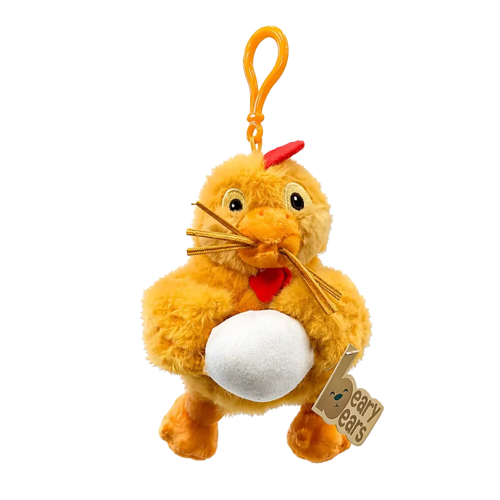 Cute chicken plush keychain holding an egg, with orange clip, red comb and soft fluffy yellow fabric on a clean white background