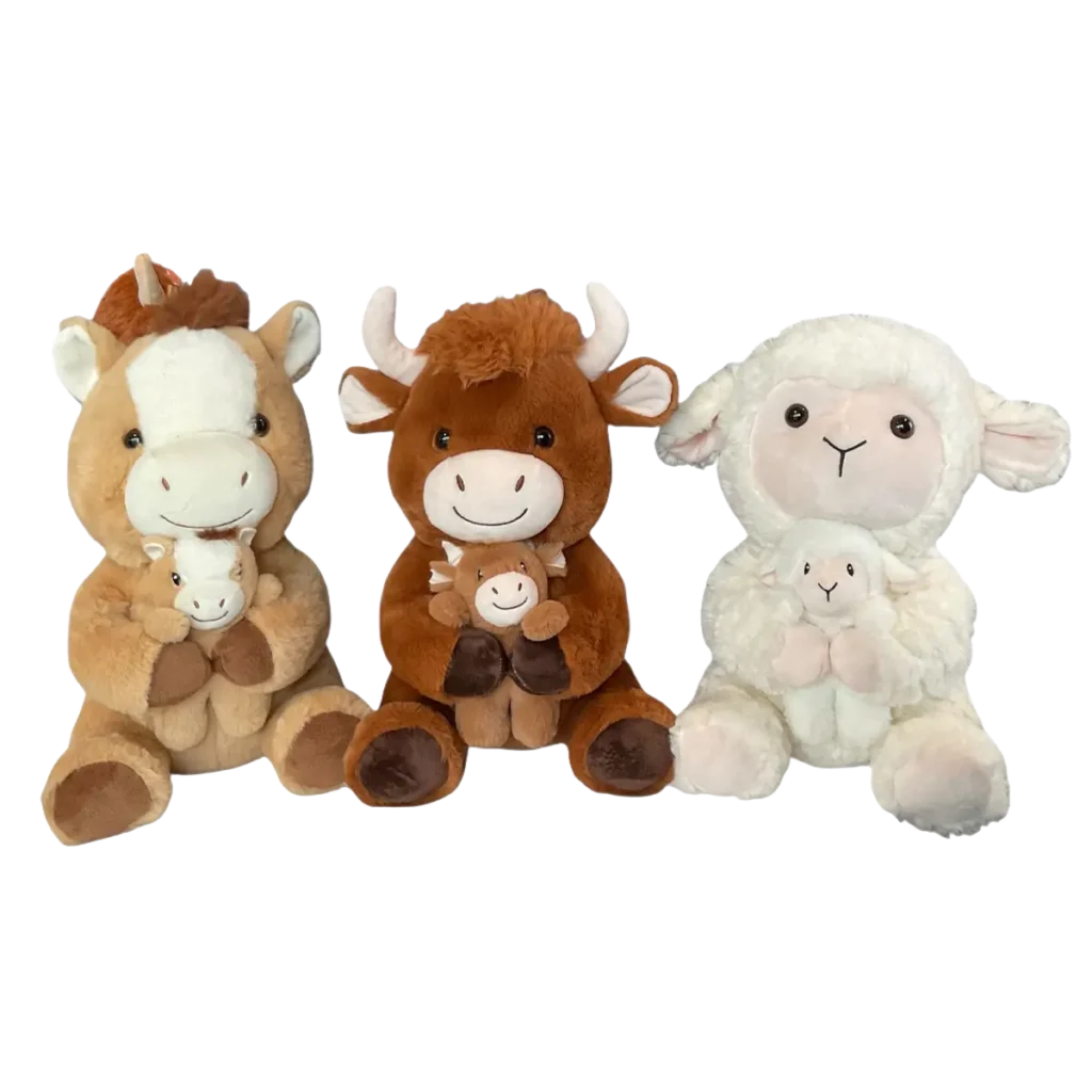 A plush unicorn, a highland cow, and a sheep, each holding a baby, sit together against a white background.