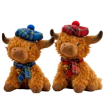 Two Scottish Highlander plush toys with red and blue tartan hats and scarves, brown shaggy fur, sitting side by side